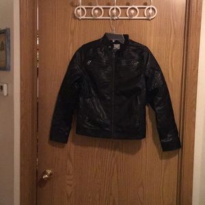 Women’s 1989 Place black jacket.